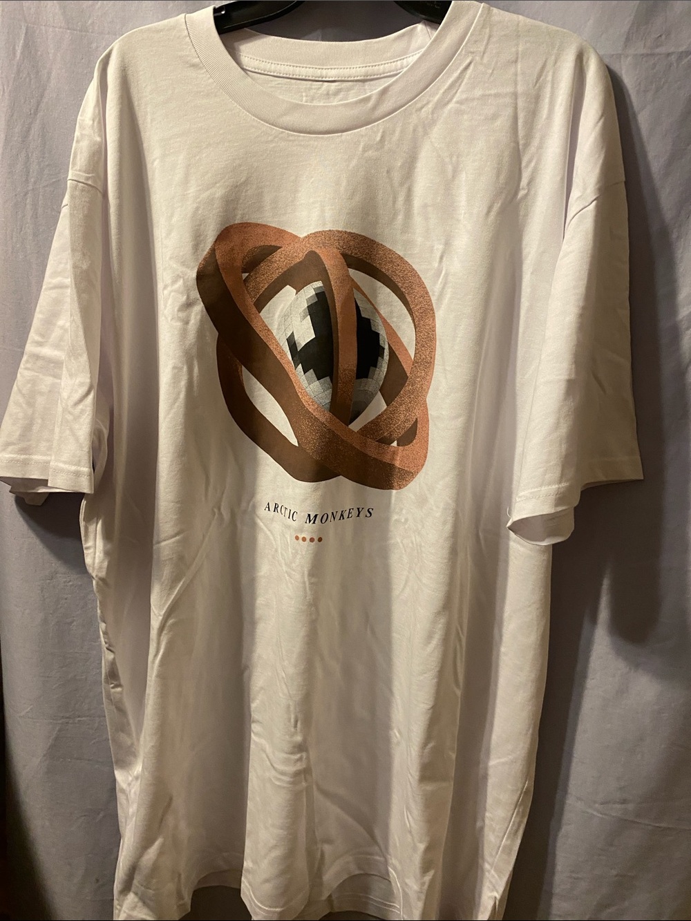 Artic Monkey White Short-Sleeve Graphic Tee with Bronze Orb
